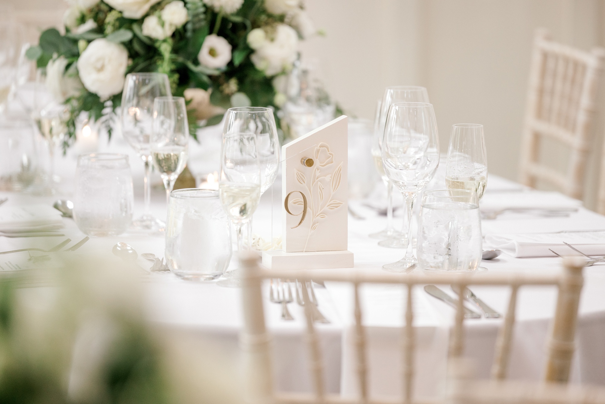 wedding reception at Ryland Inn with gold and white decor