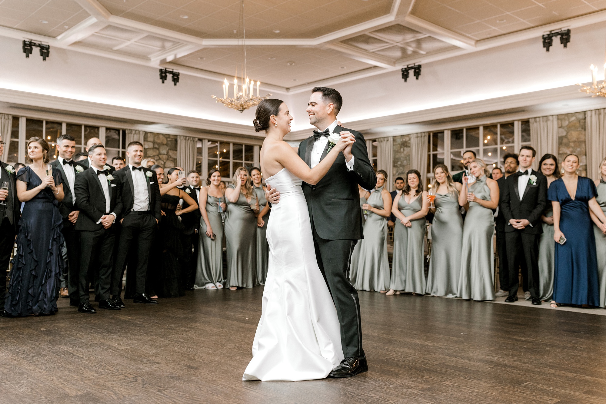 bride and groom dance together at Fiddler's Elbow Country Club