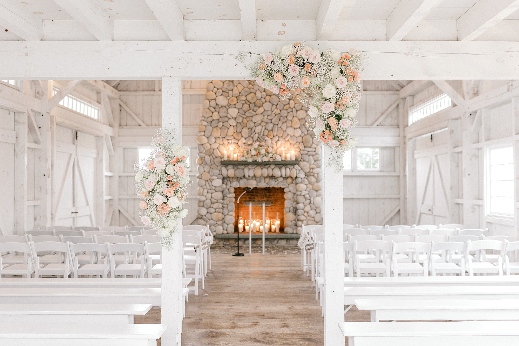 ceremony site inside chapel at Bonnet Island Estate with pink and white flowers