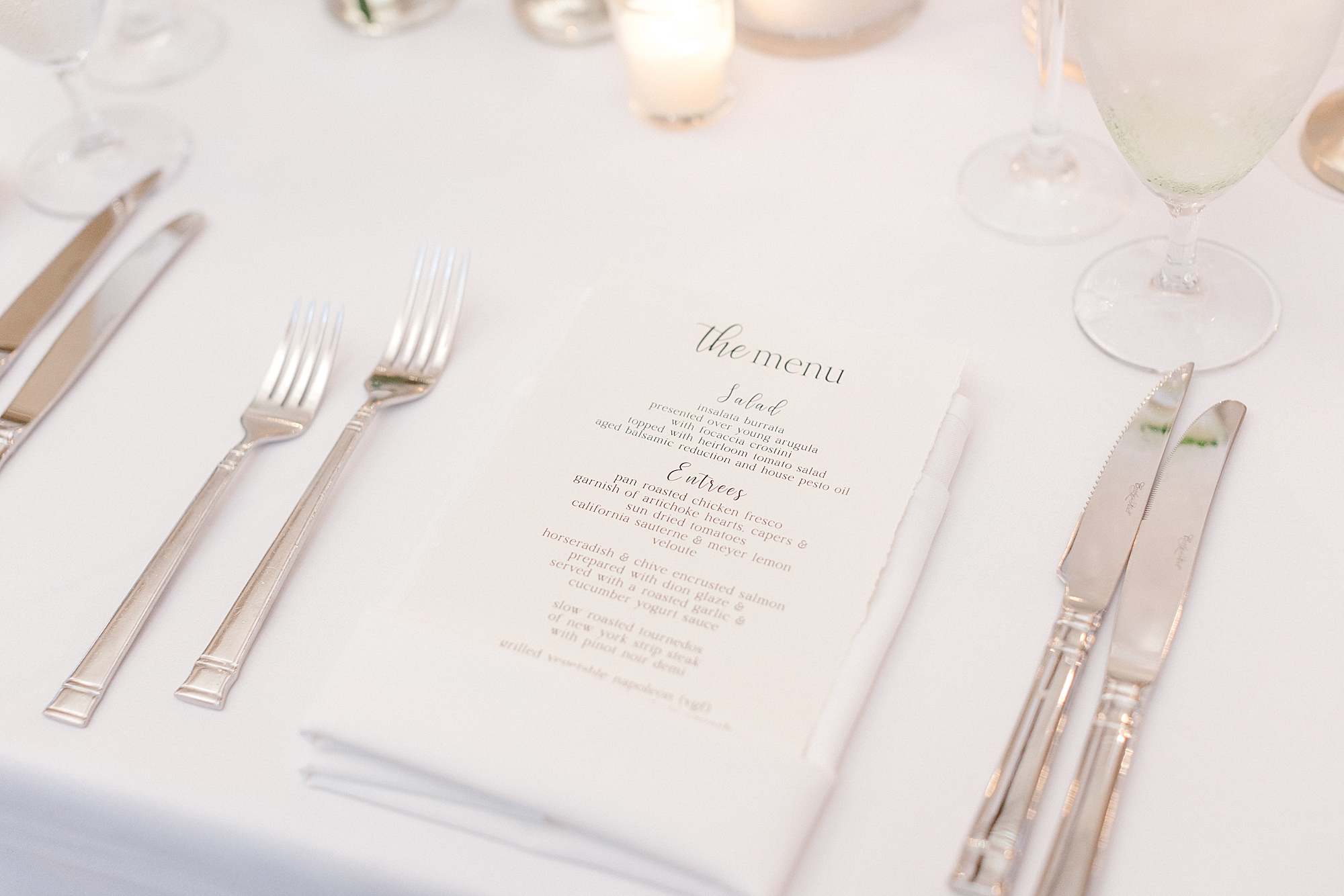 menu card on white napkins for summer wedding reception at Bonnet Island Estate