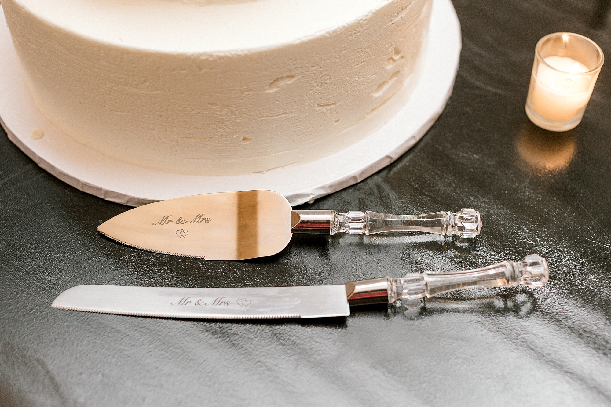 custom silver cake cutting utensils for summer wedding reception at Bonnet Island Estate
