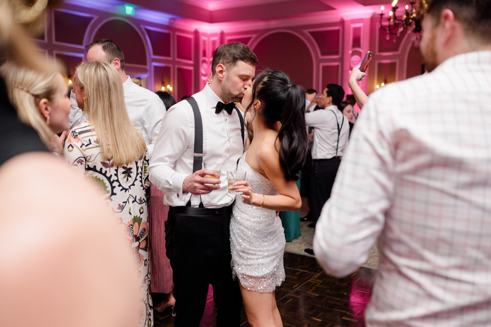 Bride and groom share kiss on dance floor at Lakewood Ranch Golf & Country Club