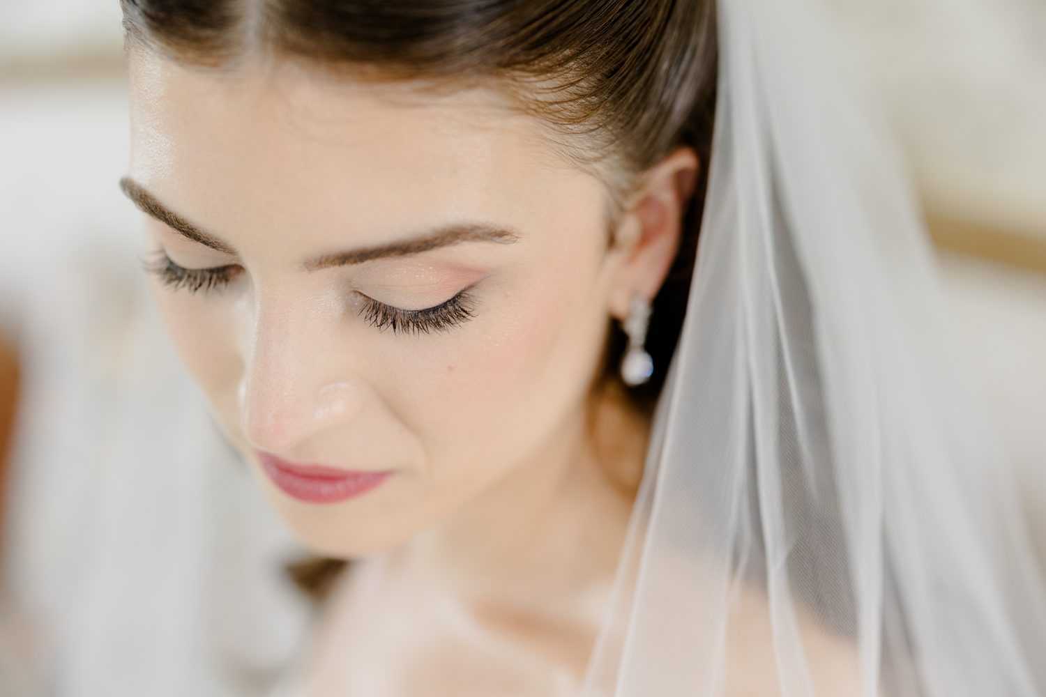 Close beauty portrait of Abby with her veil, NJ wedding photographer